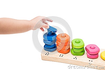 Baby Hand Playing Toy Stock Photo