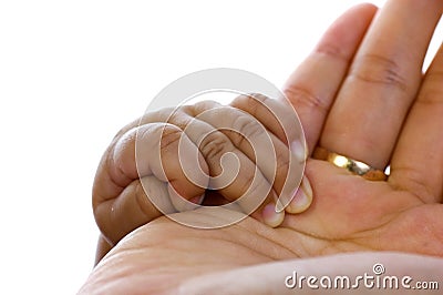 Baby hold mother's hand Stock Photo