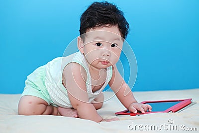 Baby with Ipad Stock Photo