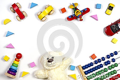 Baby kids toys frame on white background. Top view, flat lay. Copy space for text Stock Photo
