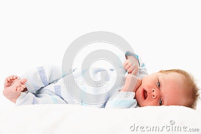 Baby Laying On Towel Stock Photo