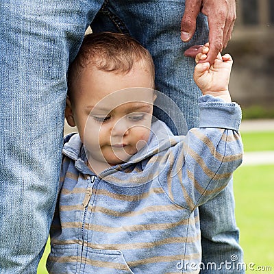 Baby learning to walk Stock Photo