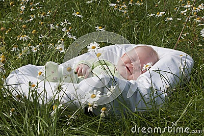 The baby lies in a cradle Stock Photo