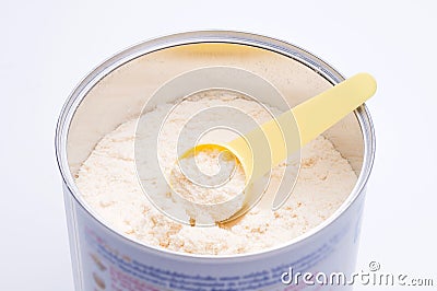 Baby milk powder in cans that open with a spoon Stock Photo