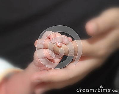 Baby and mother hand Stock Photo