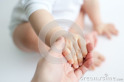 Baby and mother hands Stock Photo