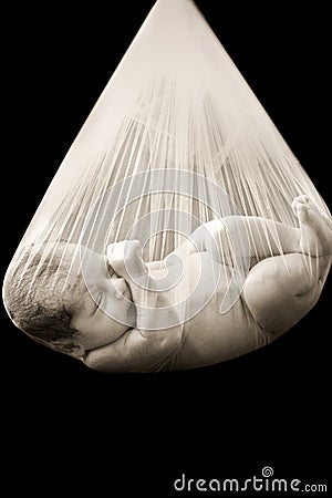 Baby in net Stock Photo