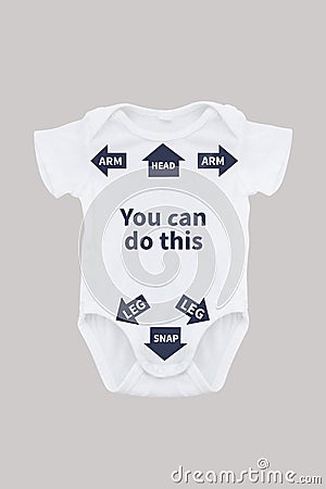 Baby onesie with instructions for dad Stock Photo