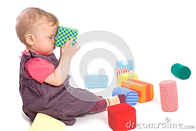 Baby palying with toy blocks Stock Photo