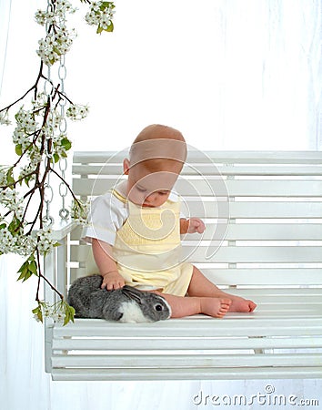 Baby Petting Bunny Stock Photo