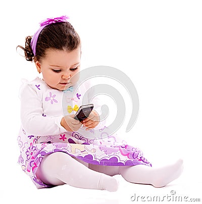 Baby with phone mobile Stock Photo