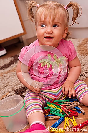 Baby play in bathroom Stock Photo