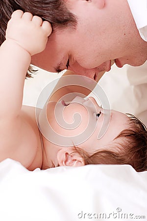 Baby play with father Stock Photo