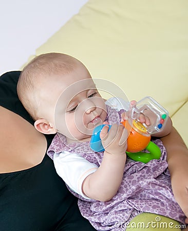 Baby playing Stock Photo