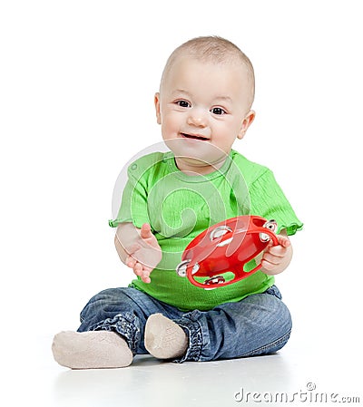 Baby playing with musical toy Stock Photo