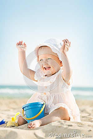 Baby playing at the sea Stock Photo