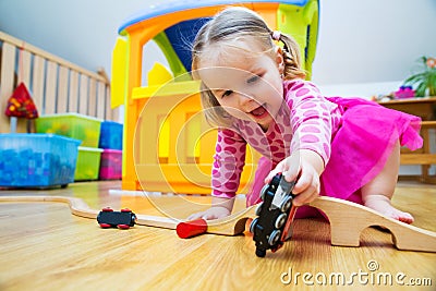 Baby playing with toys Stock Photo