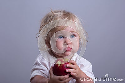 Baby a red apple Stock Photo