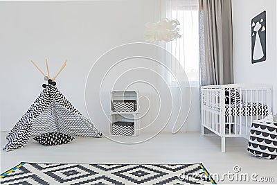 Baby room with white cot Stock Photo