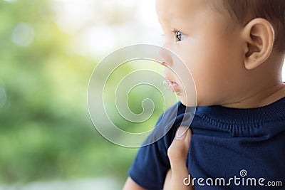 Baby with saliva Stock Photo