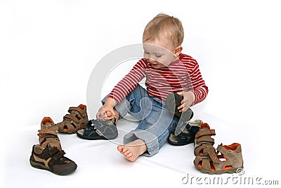 Baby and shoes Stock Photo