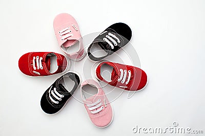 Baby shoes, kids, parent, blue, boy, sneakers, toy, copyspace, wooden Editorial Stock Photo