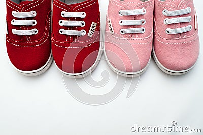 Baby shoes, kids, parent, blue, boy, sneakers, toy, copyspace, wooden Editorial Stock Photo