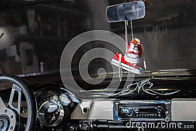 Baby Shoes in a Classic Chevy Car Editorial Stock Photo