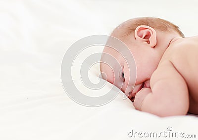 Baby sleeping in bed Stock Photo