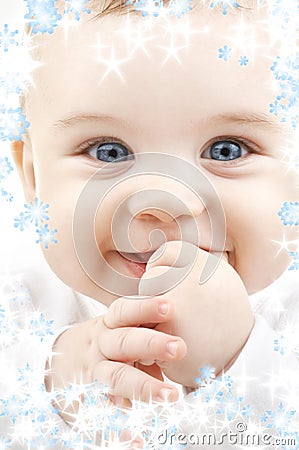 Baby with snowflakes Stock Photo