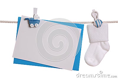 Baby sock and blank note Stock Photo