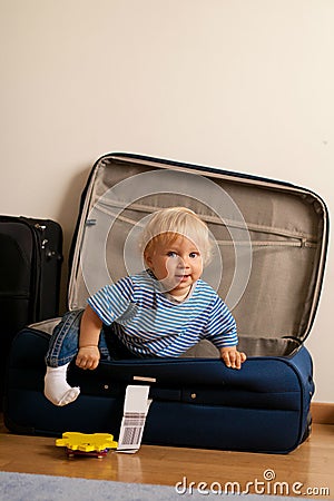 Baby in suitcase Stock Photo