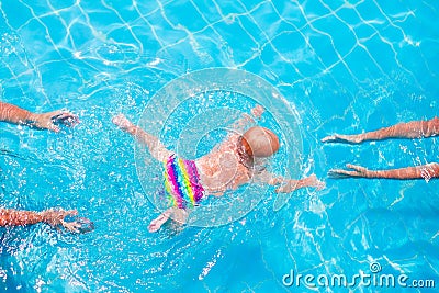 Baby swimming underwater Stock Photo