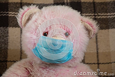 Medical teddy bear masked closeup coronavirus epidemic Stock Photo