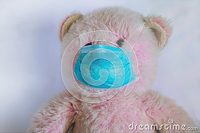 Medical teddy bear masked closeup coronavirus epidemic Stock Photo