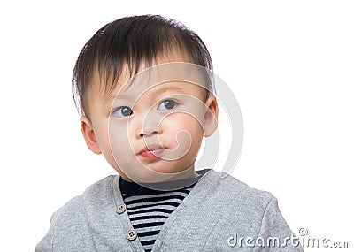 Baby thinking Stock Photo