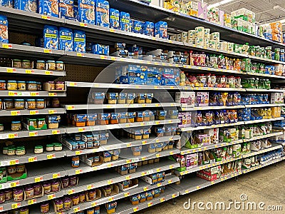 The baby and toddler food aisle at a Walmart Store with no people Editorial Stock Photo