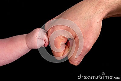 baby touching dad Stock Photo