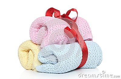 Baby towels tied with red ribbon Stock Photo