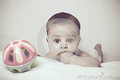 Baby and Toy Stock Photo