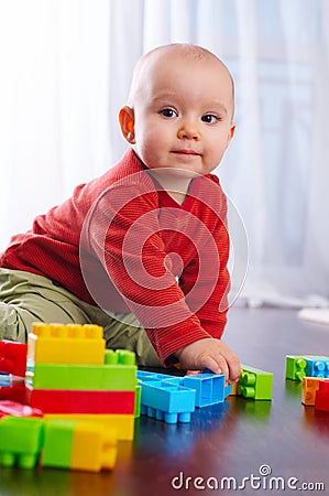 Baby with toys Stock Photo