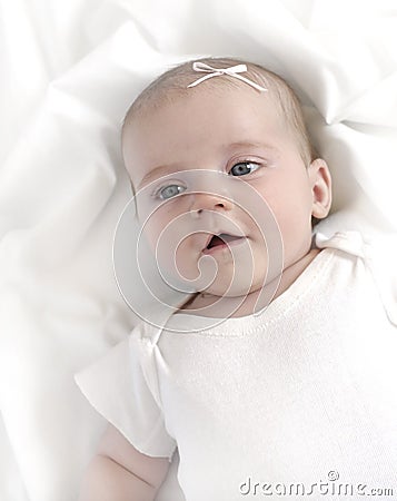 Baby on White Blanket Stock Photo