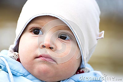 Baby in winters clothing Stock Photo