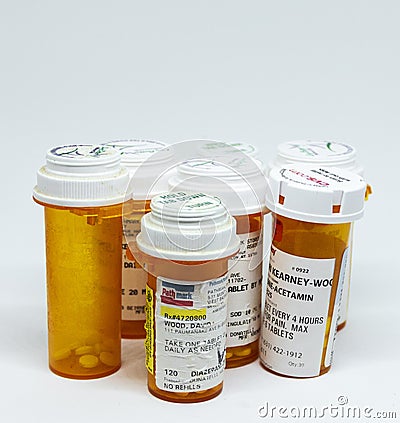 Seven bottles of pills Editorial Stock Photo