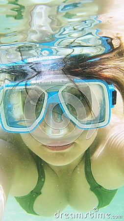 Bacalar, Mexico - November 21, 2010. Woman with diving mask in Lagoon Bacalar in Mexico, Yucatan peninsula Editorial Stock Photo