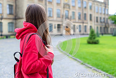 Back behind rear close up view photo of crying depressed stressed workless one lonely hipster looking at the campus doors Stock Photo