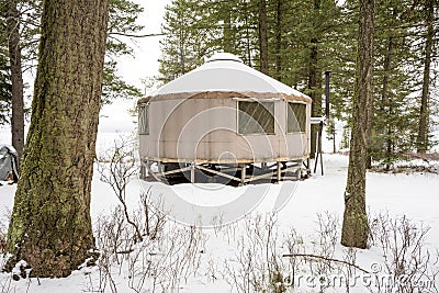 Back country Yurt winter forest with snow Stock Photo