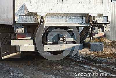 The back of a dirty gray truck with a black iron bumper Stock Photo