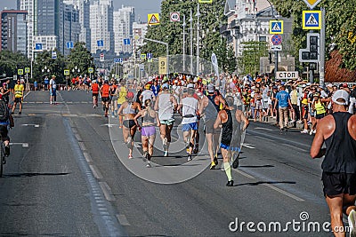 back group male and female runners running in Europe-Asia Marathon Editorial Stock Photo