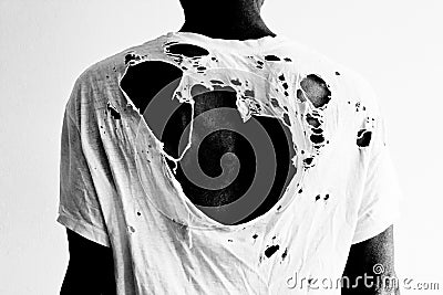 Back of a man with ripped white t-shirt Stock Photo